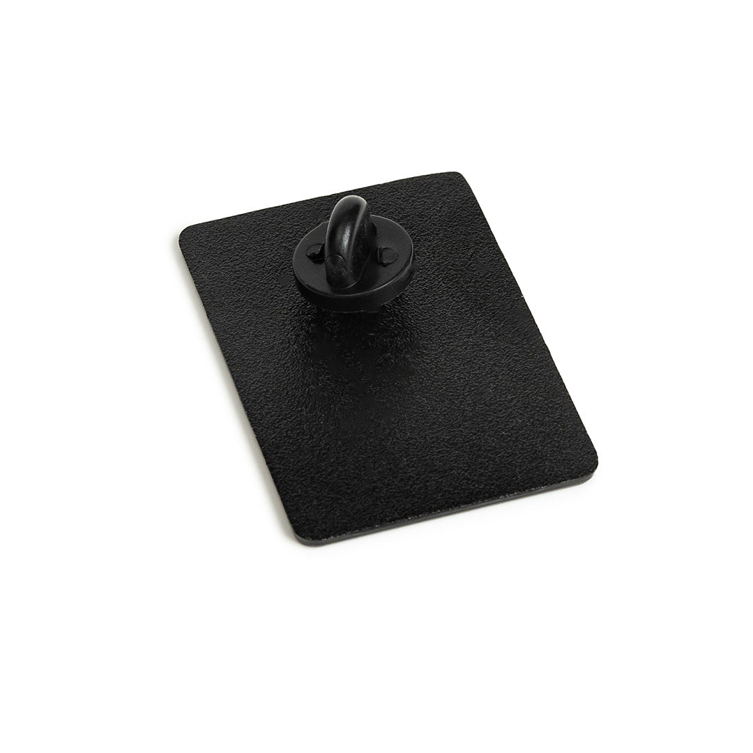 Black square with a central round pin back on a white background