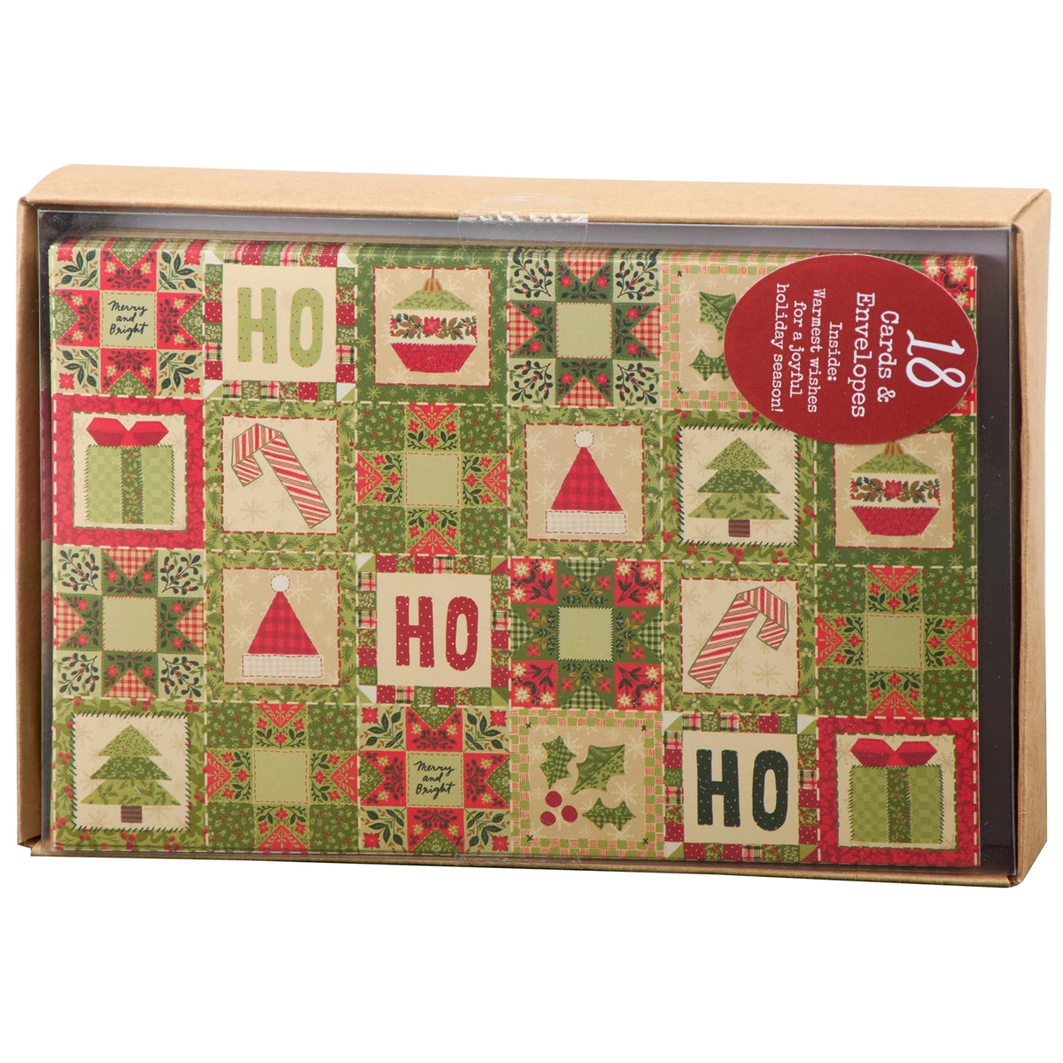 A box of holiday cards featuring a green and red Christmas quilt design on a white background