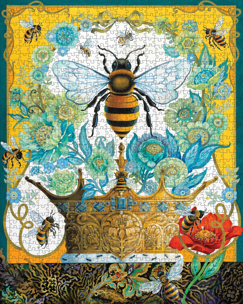 A completed 1000 piece puzzle feauting artwork by David Galburt of a bee and crown on a yellow and white background with blue flowers