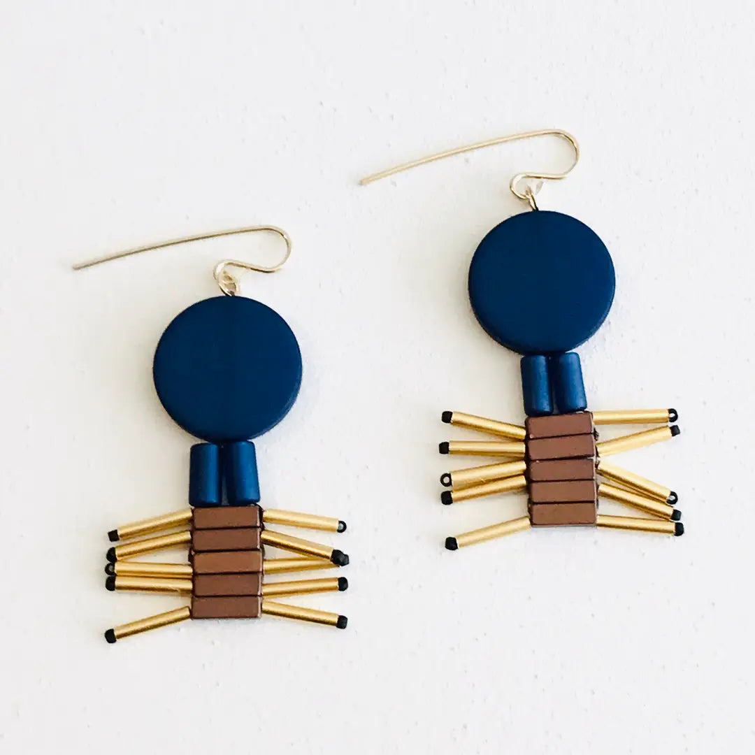 Pair of earrings with blue, brown, and gold design on a white background