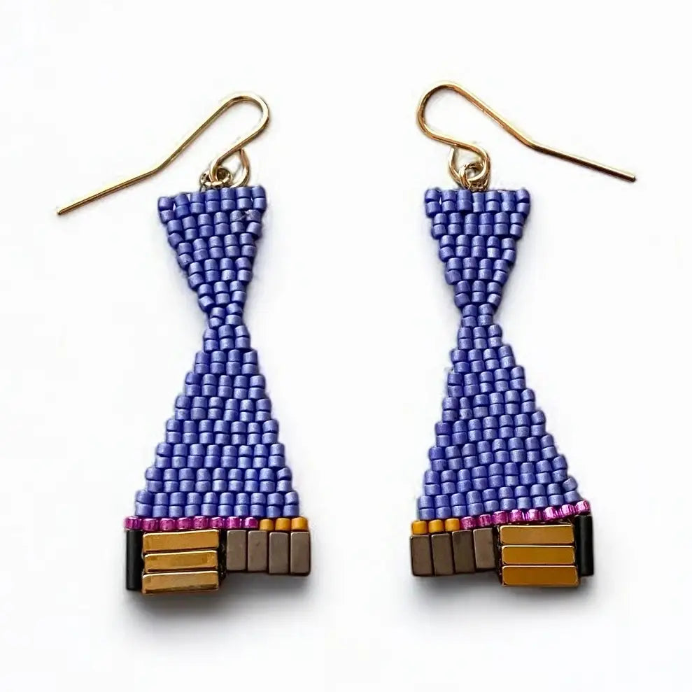 Pair of beaded earrings with geometric design on a white background