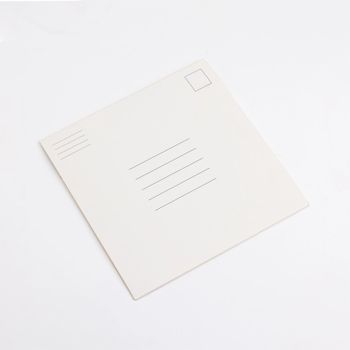 White postcard with lines for writing on a white background