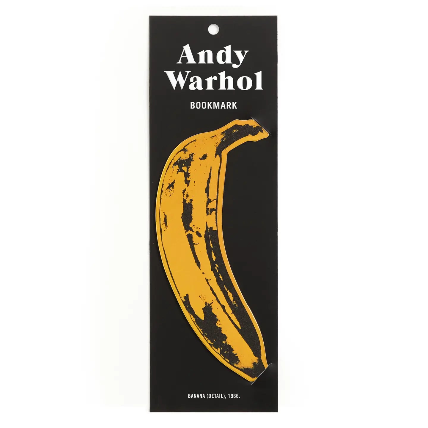 A banana shaped bookmark held in black rectangular packaging with the words "Andy Warhol Bookmark" on a white background.