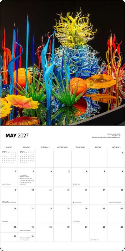 Open calendar page with a multicolored glass sculpture pictured at the top and a monthly calendar grid with the words May 2027 at the bottom.