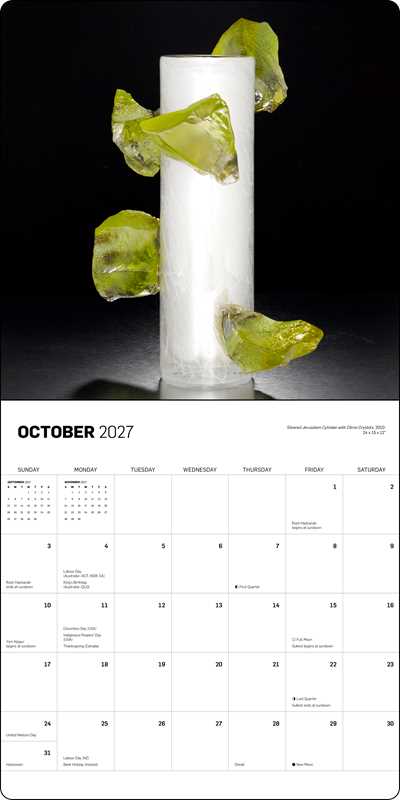 Open calendar page with a green and white glass sculpture pictured at the top and a monthly calendar grid with the words October 2027 at the bottom.