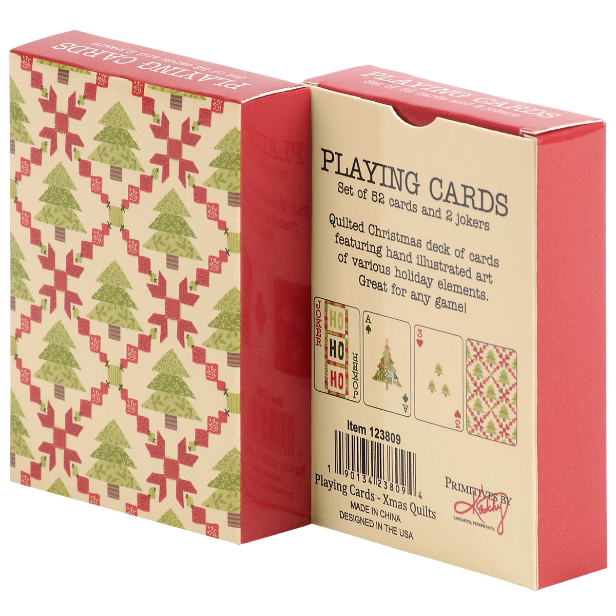 Christmas-themed playing cards deck box shown from two angles: one side features a quilted pattern of green Christmas trees and red snowflake motifs on a beige background, while the other displays the red side with product details and card illustrations.
