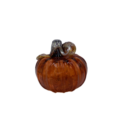 A small decorative glass pumpkin with a ribbed body and a curled stem, shown on a plain white background.