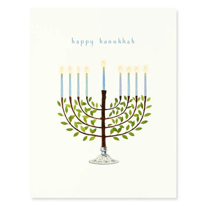 A cream card with a the words "happy hanukkah" and a watercolor image of a menorah on a white background