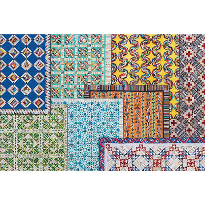 A collage of eight multi-color quilts on a white background.