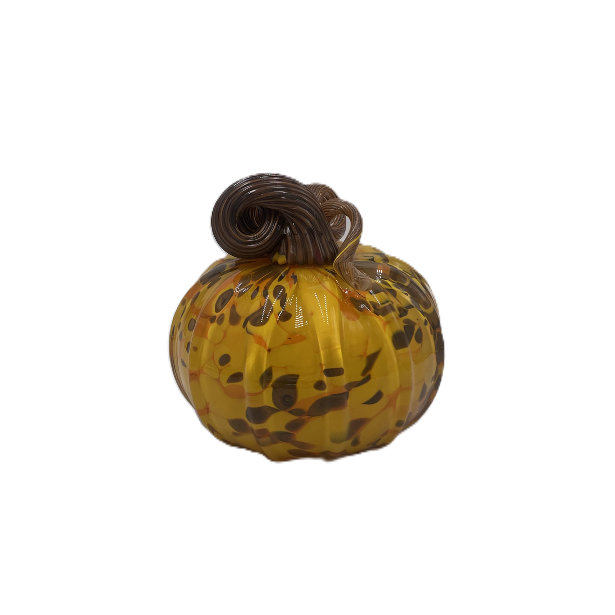A small decorative glass pumpkin with a marbled amber-yellow body, dark brown and orange speckles, and a dark brown stem, isolated on a white background.