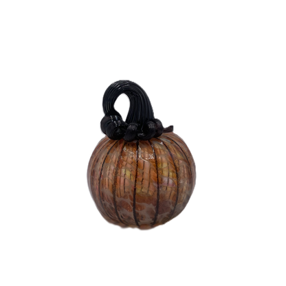 A small decorative glass pumpkin with a ribbed body, amber-orange marbling, and a black stem, isolated on a white background.