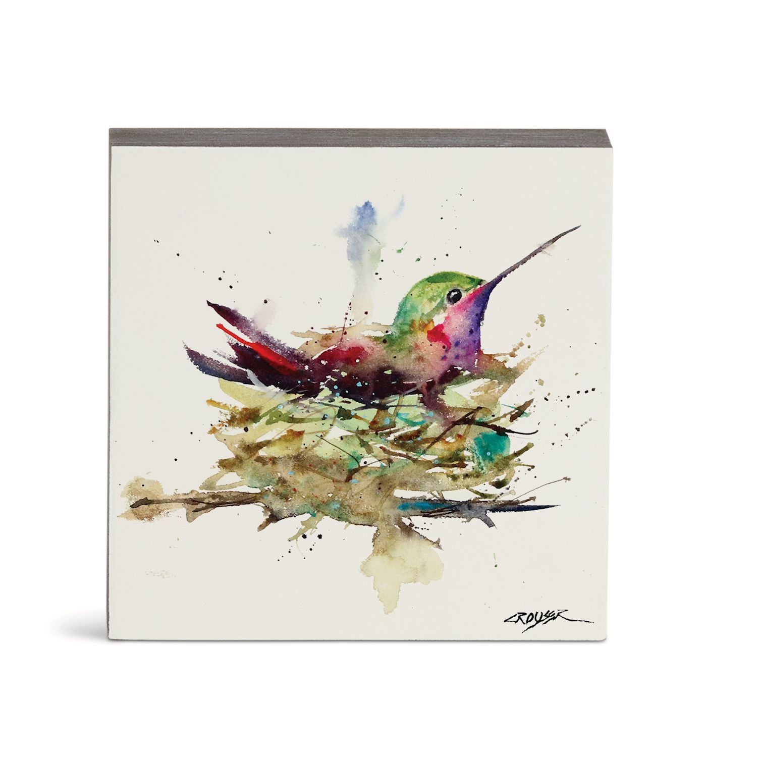 A square wall art print featuring a colorful watercolor painting of a hummingbird perched on a nest, shown against a clean white background.