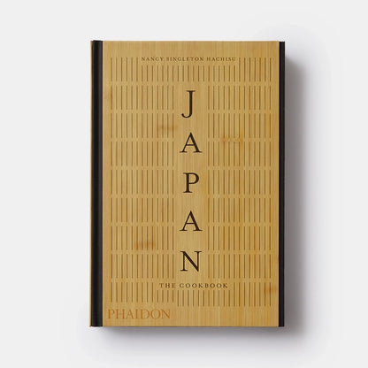A tan cookbook titled Japan The Cookbook.