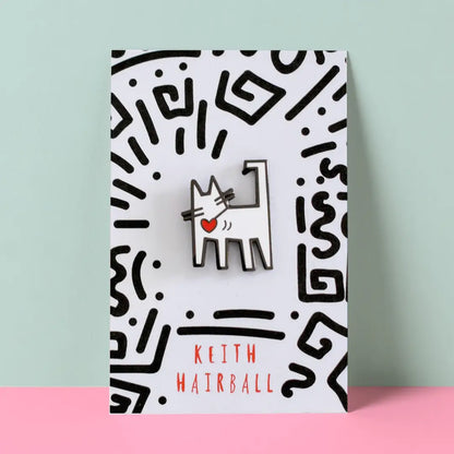 Cat Pin with a design on a card featuring geometric patterns and 'Keith Hairball' text.