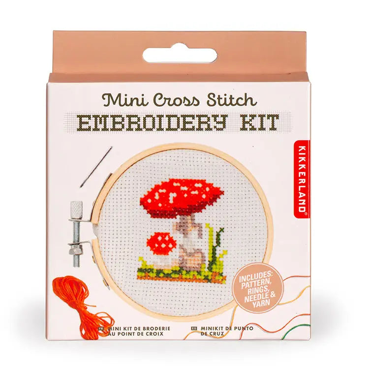 Kikkerland Mini Cross Stitch Embroidery Kit packaging with a mushroom design.