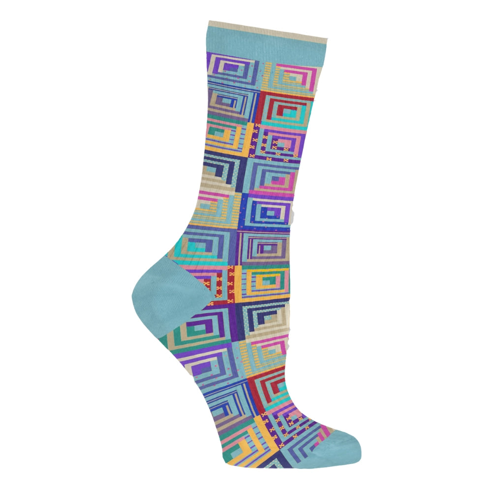 A single crew sock with a colorful geometric log cabin quilt pattern and solid light blue heel, toe, and cuff, shown on a plain white background.