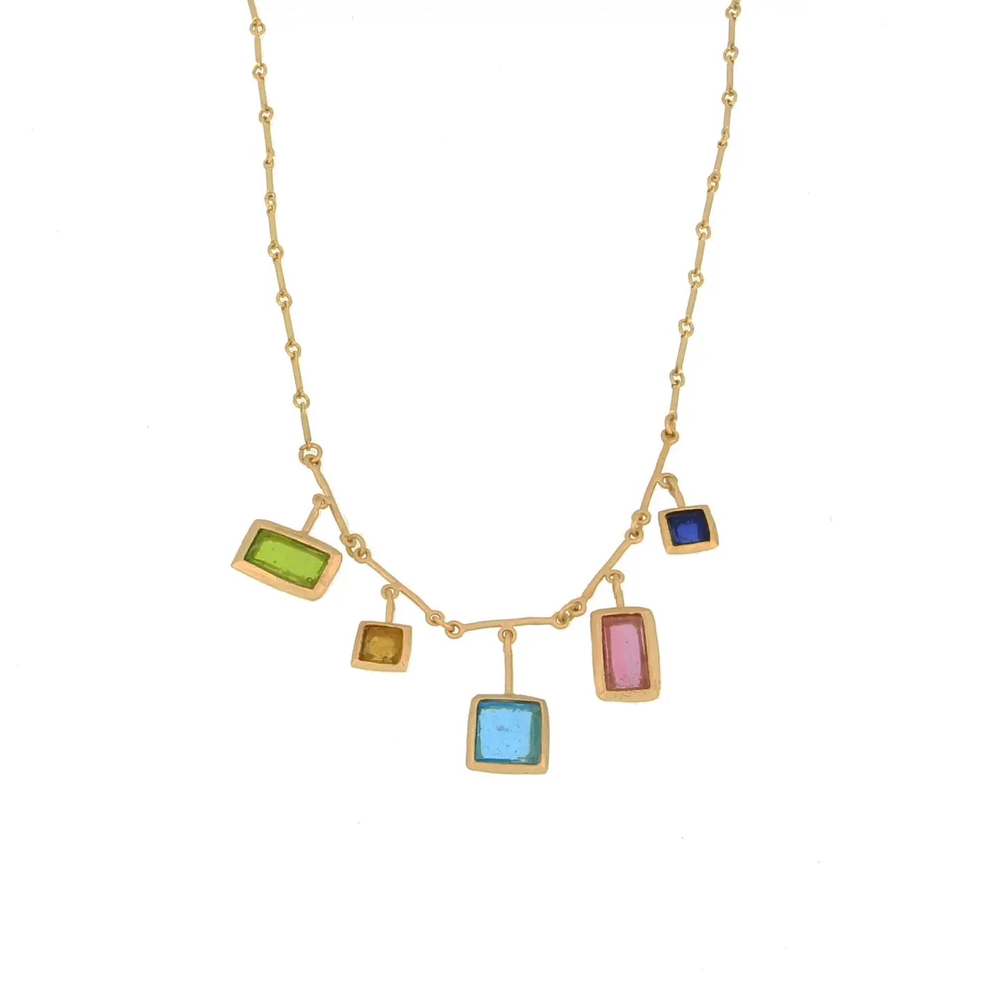 Necklace with colorful square glass pendants on a gold chain against a white background