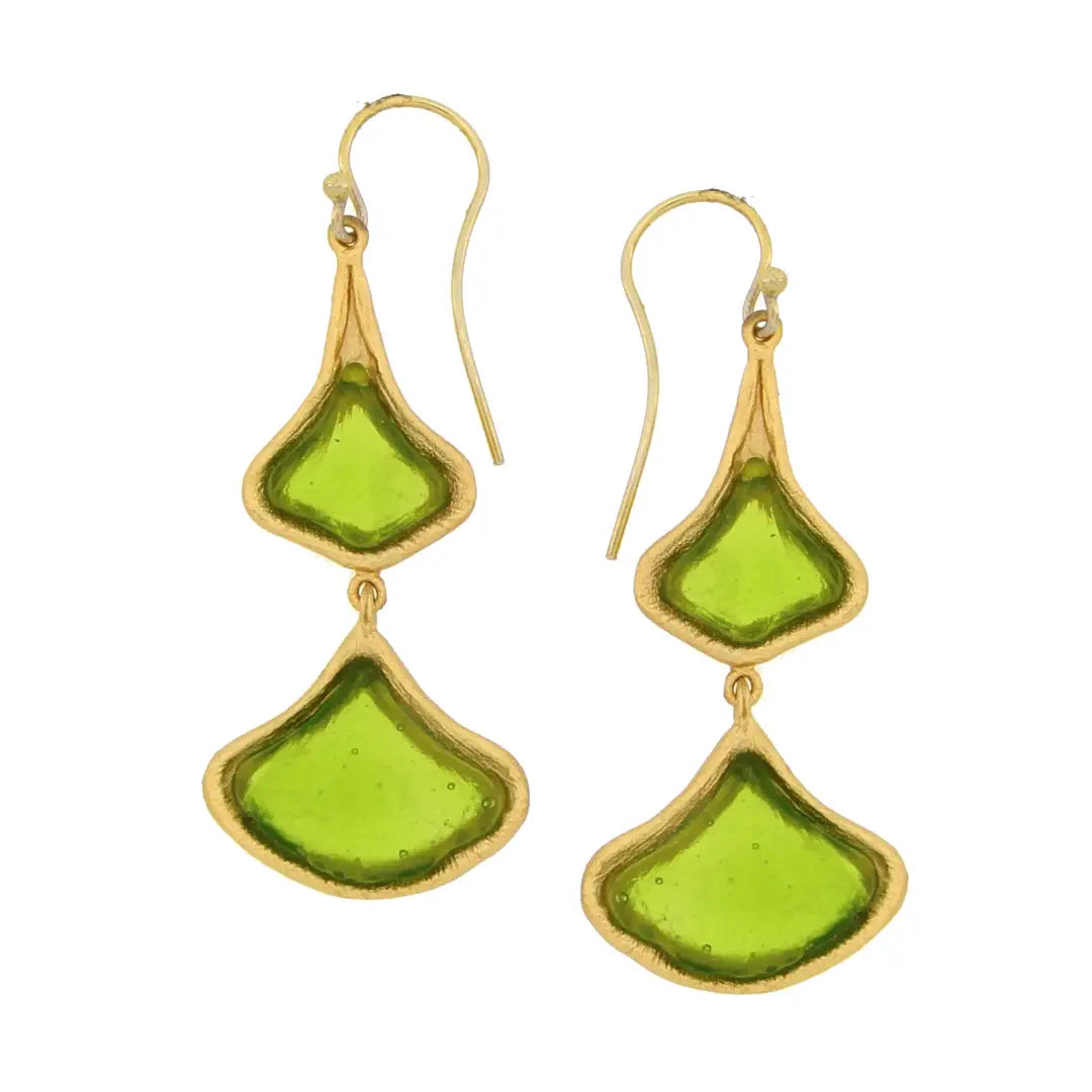 Green earrings with gold accents on a white background
