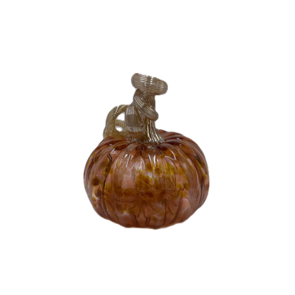 A decorative glass pumpkin with a ribbed orange body and a twisted Champagne stem, shown on a plain white background.