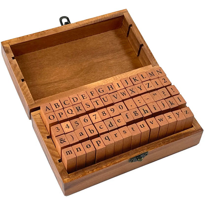 Wooden stamp set with alphabet and numbers in a wooden box