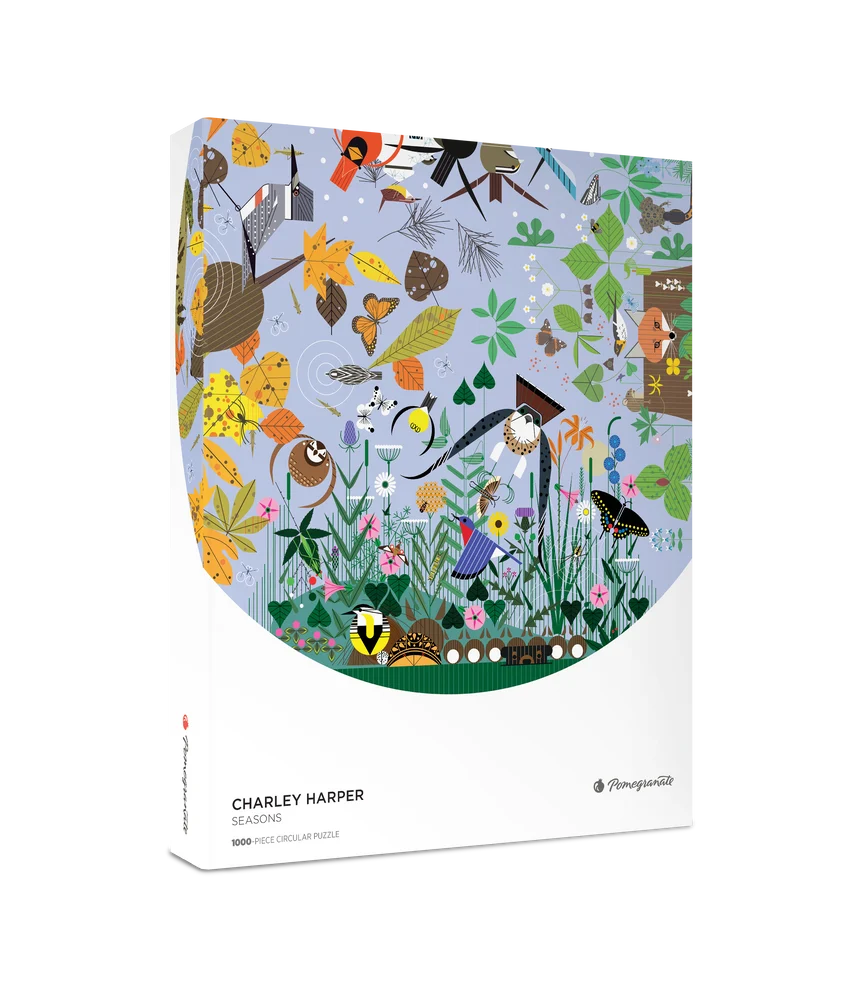 Packaging for a 1000 piece jigsaw puzzle featuring a circular artwork dipicting a variety of multi-color birds on a light blue background and the words "Charley Harper Seasons."
