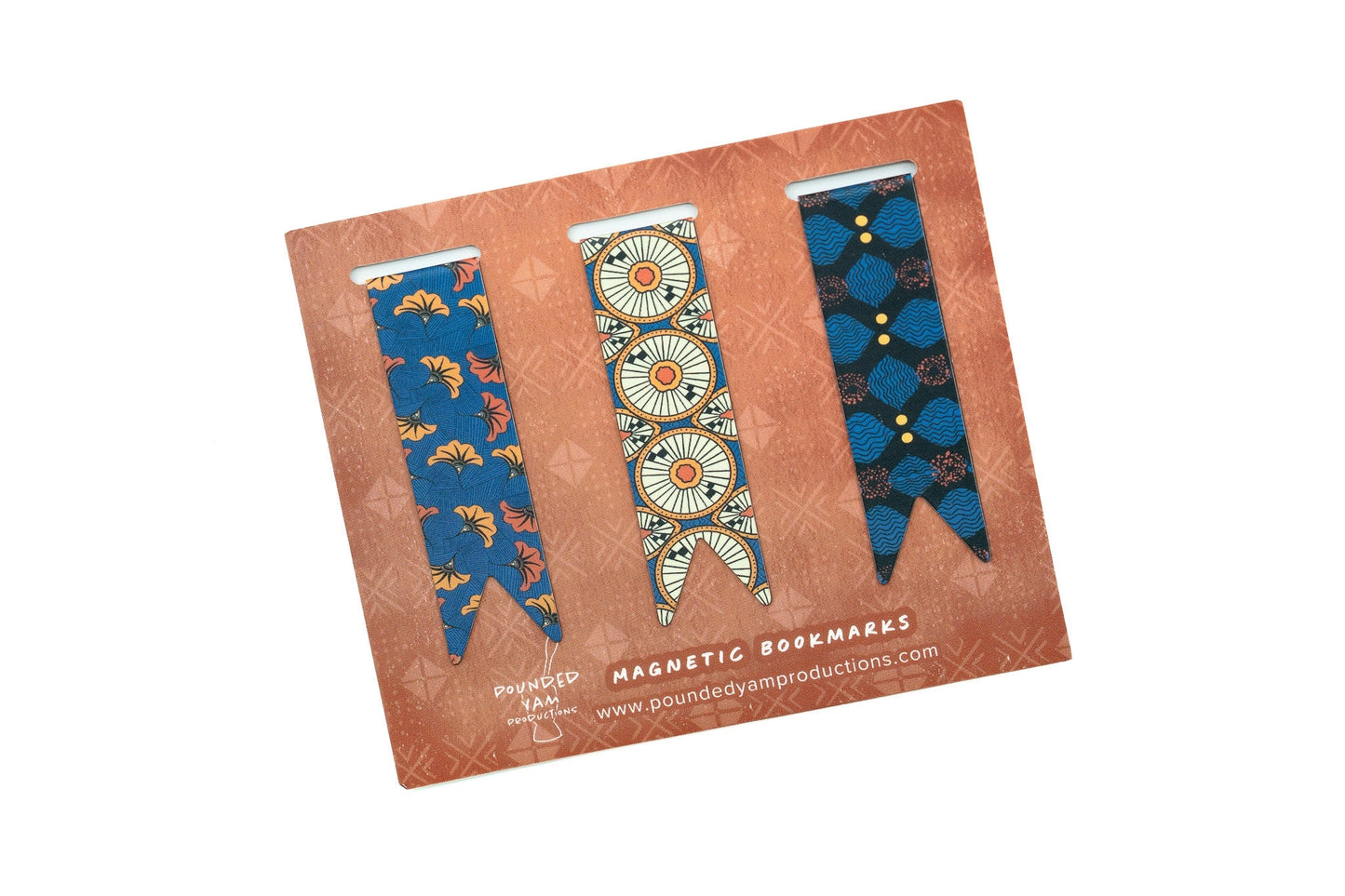 Three decorative magnetic bookmarks on a brown card 