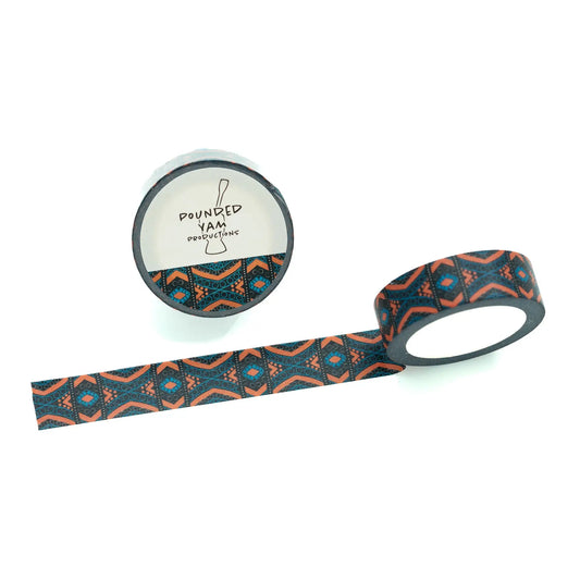 A roll of patterned washi tape with a black, orange, and teal geometric design, shown partially unrolled next to its white spool which features the 'Pounded Yam Productions' brand logo.