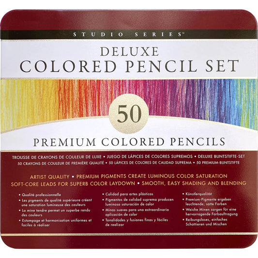 Studio Series Deluxe Colored Pencil Set in a square tin with rounded corners, featuring a multicolor rainbow pencil body design and a dark red border with white text.