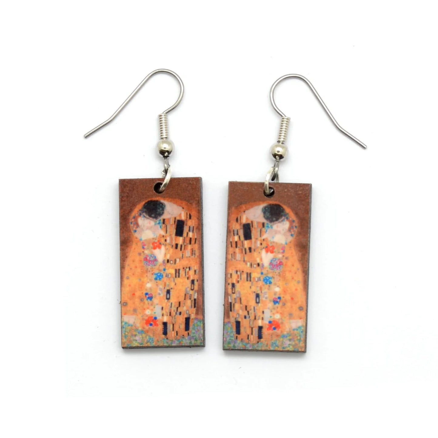 Earrings with 'The Kiss' by Gustav Klimt design on a white background