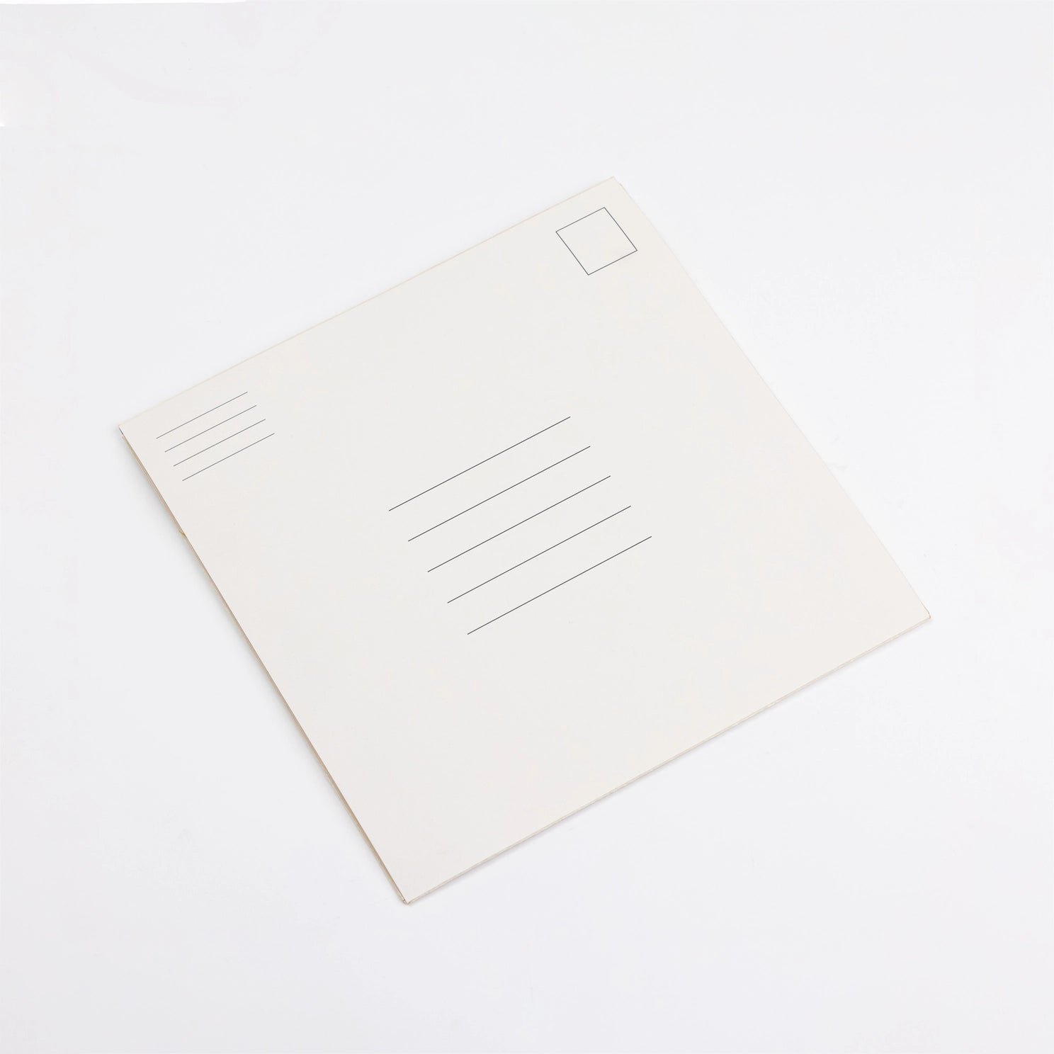 White postcard with lines for writing on a white background