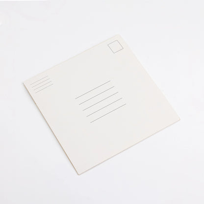 White postcard with lines for writing on a white background